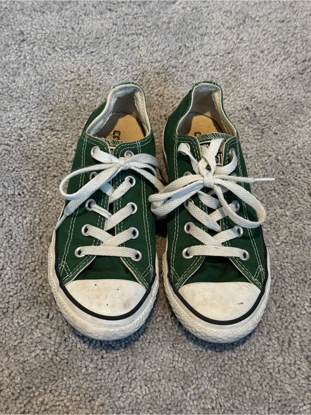 green canvas Converse Chuck Taylor All Star low top sneakers